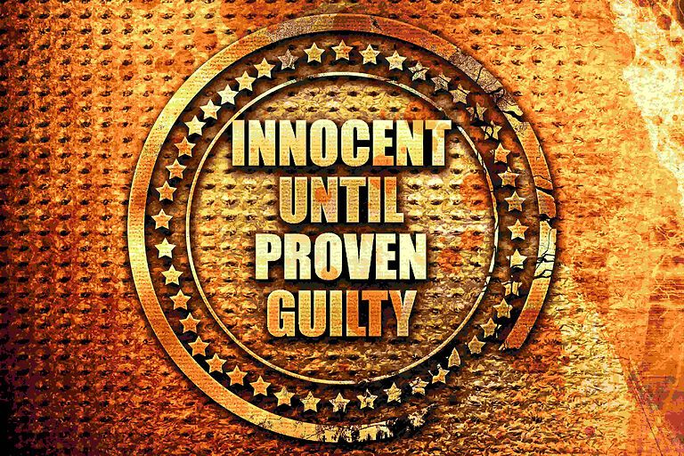 Innocent until proven guilty stamp graphic
