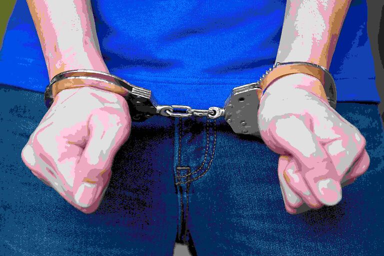 Person in handcuffs